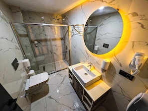 Standard Triple Room | Bathroom | Shower, hair dryer, slippers, towels