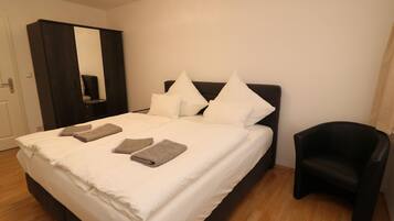 Apartamento | 2 quartos, individualmente mobiliados, roupa de cama