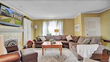 Smart TV, fireplace, books