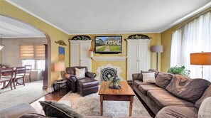 Smart TV, fireplace, books