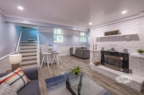Smart TV, fireplace, table tennis, books