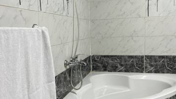 Hair dryer, bidet, towels, soap