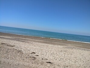 A beach with a clear sky and calm sea. - 5 Person Holiday Home in Brovst (Brovst)