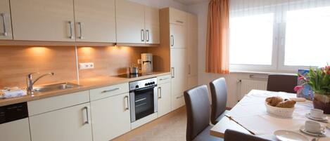Apartment | Private kitchen | Oven, electric kettle, toaster