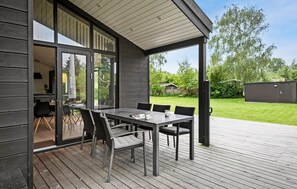Enjoy meals in a serene setting with a seamless transition between indoor and outdoor spaces.