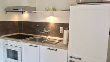 Apartemen | Dapur pribadi | Kursi makan untuk bayi