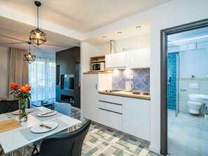 Apartment | Private kitchen | Fridge, microwave, stovetop