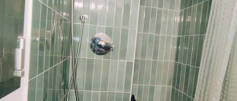 Shower, hair dryer, towels, soap