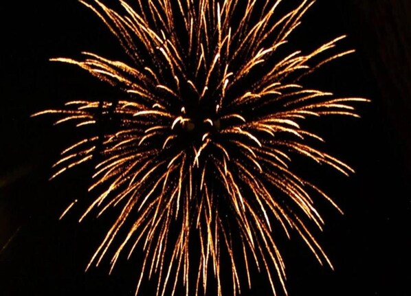 A firework display with a starburst pattern.