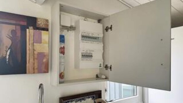 A room with a large open door, a window, and a wall-mounted artwork. - 4 Person Holiday Home in Grevinge (Grevinge)