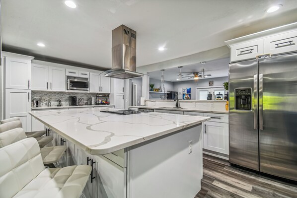 Fridge, microwave, oven, stovetop - Luxury Modern spacious 5Bedroom/3Bathroom, Theater room a game room and pool. (Brandon)