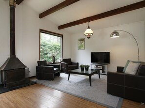 Ferienhaus | Wohnbereich | Kamin