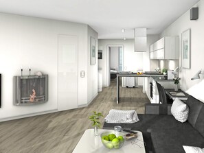 A modern, minimalist living room with a grey sofa, a coffee table with a bowl of apples, and a TV mounted on the wall. - Holiday Home in Wendtorf (Wendtorf)