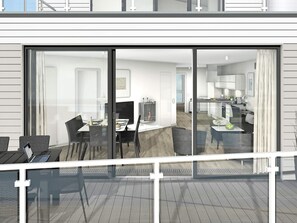 A modern interior with a dining area, kitchen, and a balcony with outdoor seating. - Holiday Home in Wendtorf (Wendtorf)