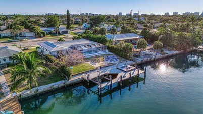 Tropical oasis on the water. Heated pool w. lots of family amenities & games