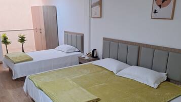 Premium bedding, down duvets, individually decorated