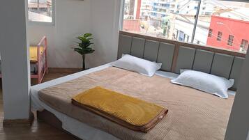 Premium bedding, down duvets, individually decorated