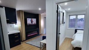 Een modern appartement met keuken, woonruimte en slaapkamer.