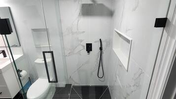 Luxury Unit | Bathroom | Free toiletries, hair dryer, towels, soap