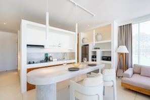 Apartment | Private kitchen | Fridge, cookware/dishes/utensils, cleaning supplies - Sore Unit 12 Apartment by Betterplace (Canggu)