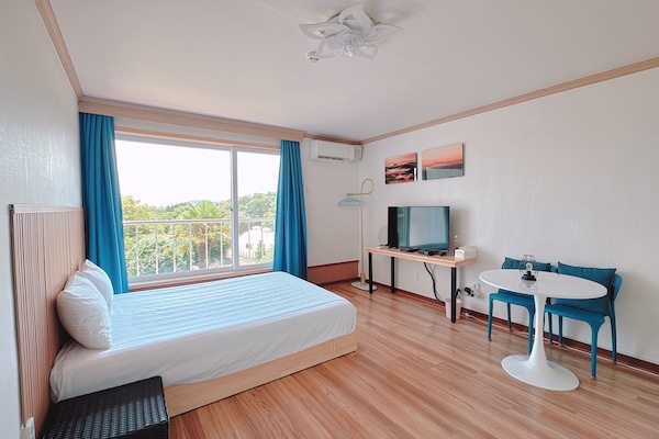 Basic Room, Multiple Beds, Kitchenette, Garden View | Blackout drapes, free WiFi, bed sheets