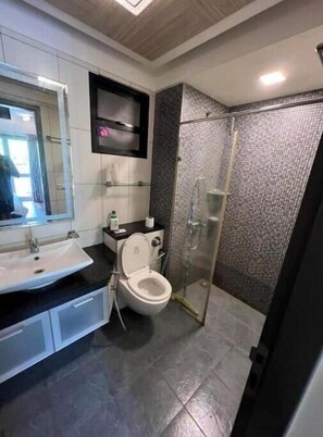 Hair dryer, towels, soap, shampoo