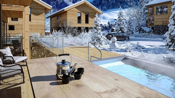 Una cabaña de madera con terraza, mobiliario exterior y un jacuzzi.