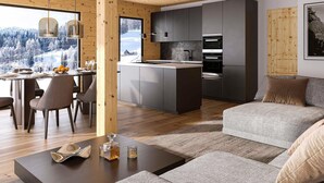 Una cocina moderna con una isla central, techo de madera y un comedor con vistas a un paisaje nevado.