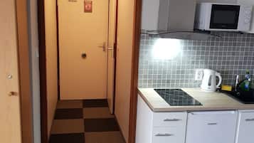 Fridge, stovetop, cookware/dishes/utensils