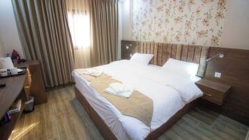 Chambre Double Deluxe, 1 trĂšs grand lit