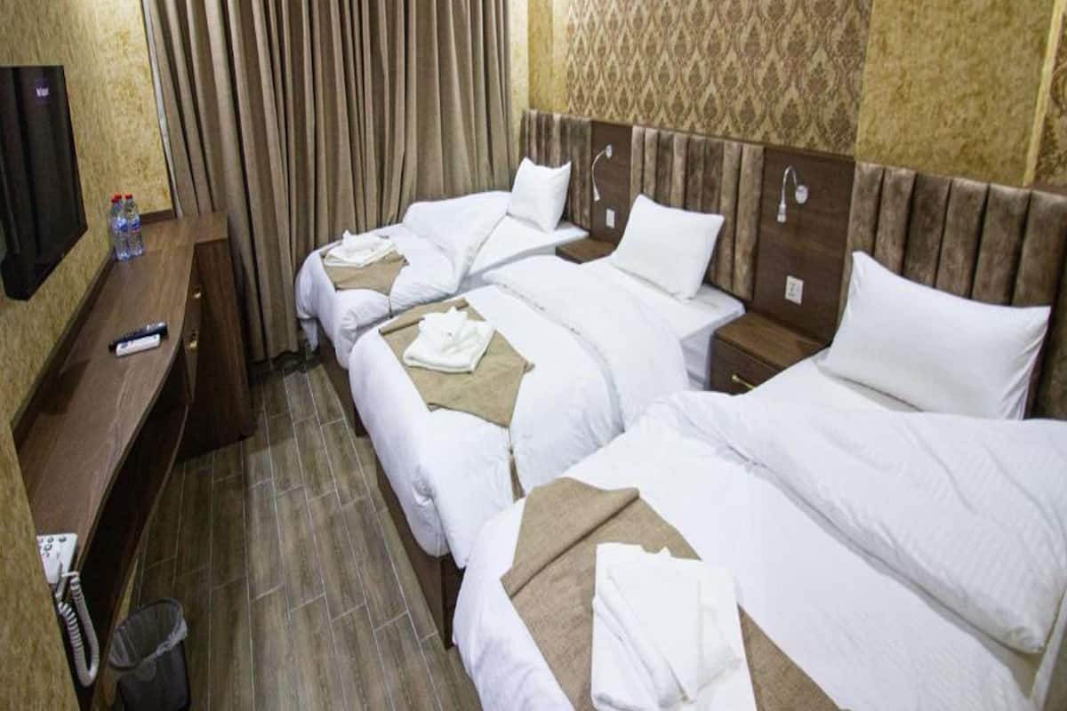 Triple Room | Bathroom | Hair dryer, towels, soap, shampoo