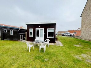 Standalone cottage with an outdoor space and parking.