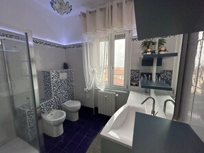 Hair dryer, towels, soap, shampoo