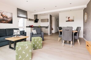 Appart'hôtel Luxe | Coin séjour | Télévision LCD, chauffage par le sol, services de streaming