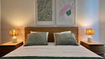 1 bedroom, desk, iron/ironing board, travel crib