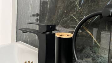 Hair dryer, towels, soap, shampoo