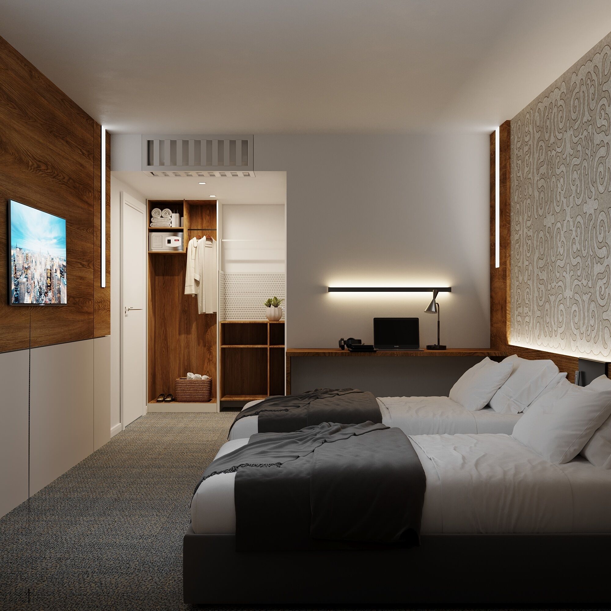 A modern hotel room with a large bed, a desk with a laptop, a wardrobe, and a TV mounted on the wall.