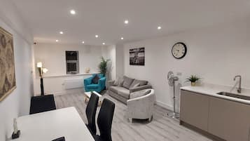 Basic Apartment, 2 Bedrooms | Living area | 43-inch Smart TV with digital channels