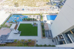 Outdoor pool - Aya - Exquisite 2BR Apt at Prive Residences, Dubai Hills (Dubai)