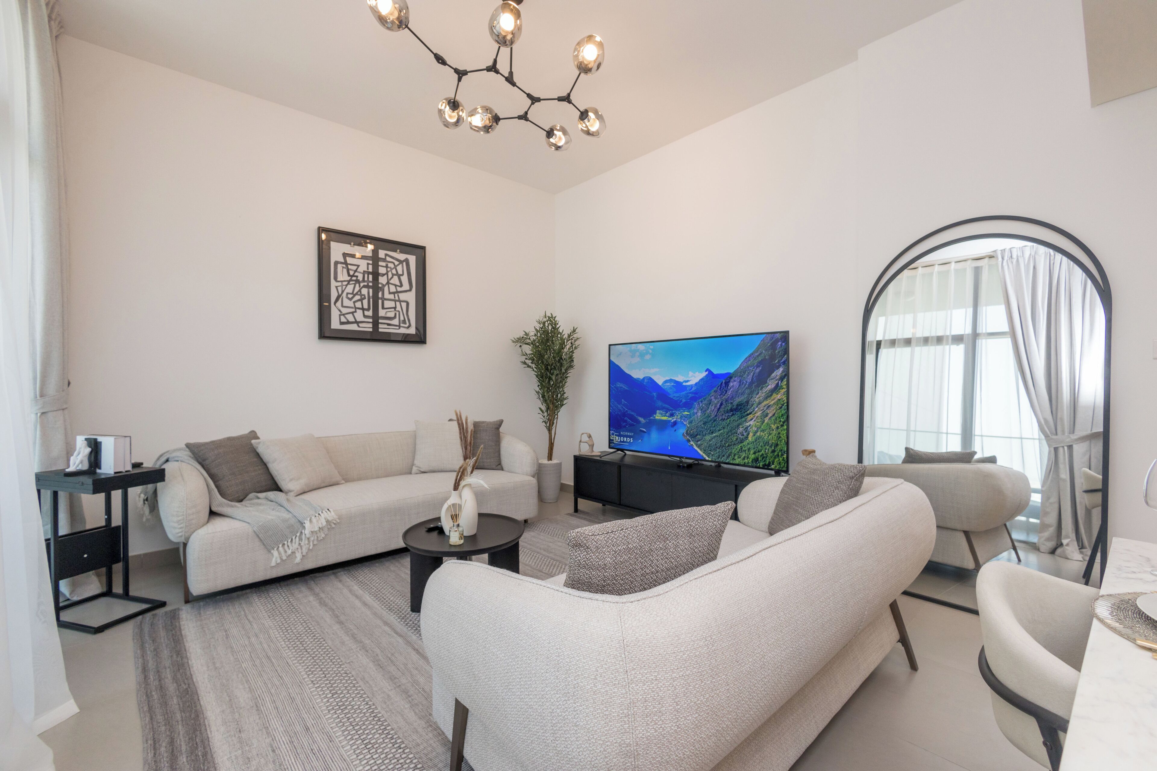 Deluxe Apartment, Balcony, Marina View | Living area | 55-inch Smart TV with cable channels, Netflix, streaming services