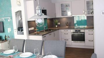 Apartment | Private kitchen | Oven, electric kettle, toaster, high chair