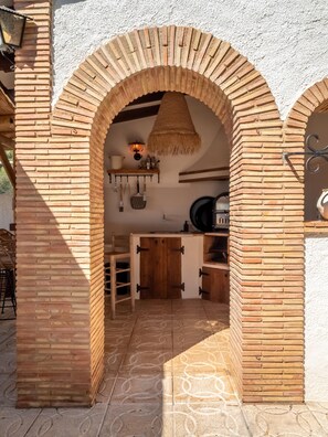 Villa | Private kitchen | Fridge, highchair