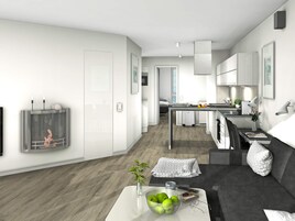 A modern apartment with a living area, kitchen, and dining space.