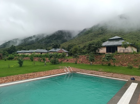Outdoor pool. Chokhiwadi Forest Retreat