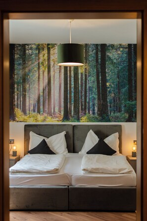 خزنة داخل الغرفة وستائر تعتيم وواي فاي مجانًا وملاءات أسرّة