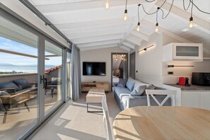 Family Suite, Sea View | Living area | TV - Ennea Muses Rooms & Suites (Nafplio)