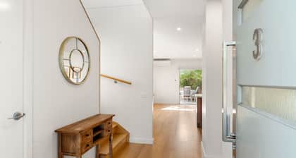 Unit 3 Broughton town house 20 meters to the beach!!