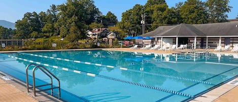 Seasonal outdoor pool, open 10:00 AM to 8:00 PM, pool umbrellas