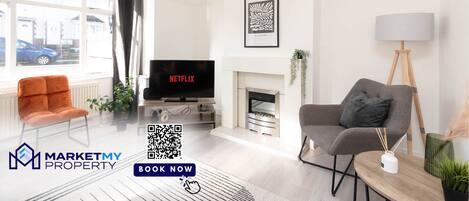 Télévision, cheminée, espaces bureaux