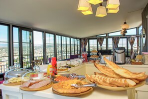 Daily buffet breakfast (USD 9.50 per person)